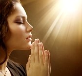 Woman Praying in the Light